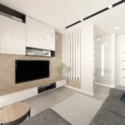 Nowoczesny salon z drewnianą ścianą dekoracyjną, białą zabudową meblową, szarą sofą z poduszkami w tropikalne wzory, okrągłym stolikiem kawowym i lampą podłogową w kształcie kuli.