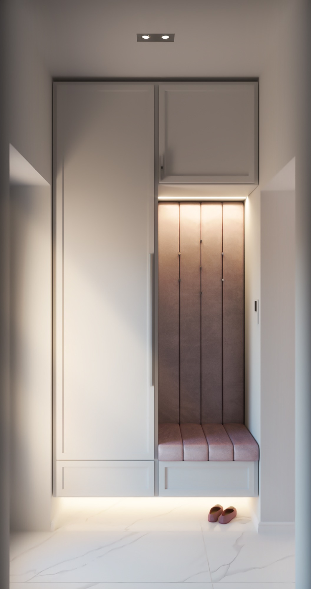 Wnęka w przedpokoju z siedziskiem obitym różowym welurem i oświetleniem LED, obok szafa w zabudowie, na podłodze białe marmurowe płytki, para różowych kapci.