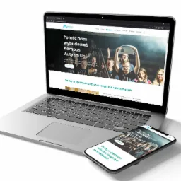 Laptop i smartfon wyświetlają stronę internetową Fundacji Autyzm Up! z hasłem 'Pomóż nam wybudować Kampus Autyzm Up!' i zdjęciem grupy osób.