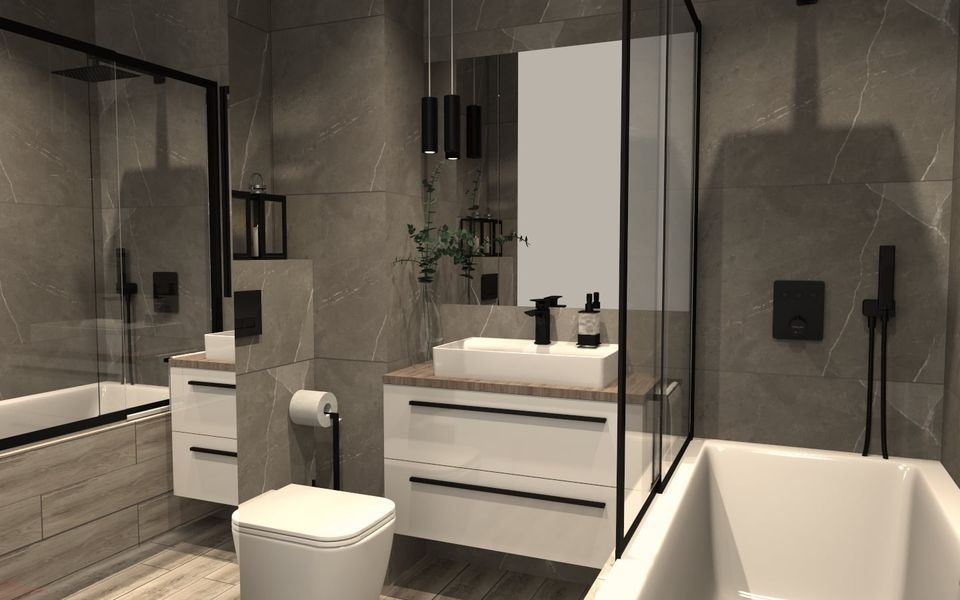 Nowoczesna łazienka z szarymi płytkami, białymi szafkami pod umywalką z drewnianym blatem, czarną armaturą i wiszącymi lampami. Widoczny fragment wanny z parawanem i toaleta.