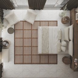 Pina-Studio.pl Natalia Piątkowska - Wnętrze sypialni w stylu boho z widokiem z góry. Łóżko na tle plecionej, kwadratowej struktury dywanu, drewniane elementy, beżowa kolorystyka, marmurowe płytki podłogowe.
