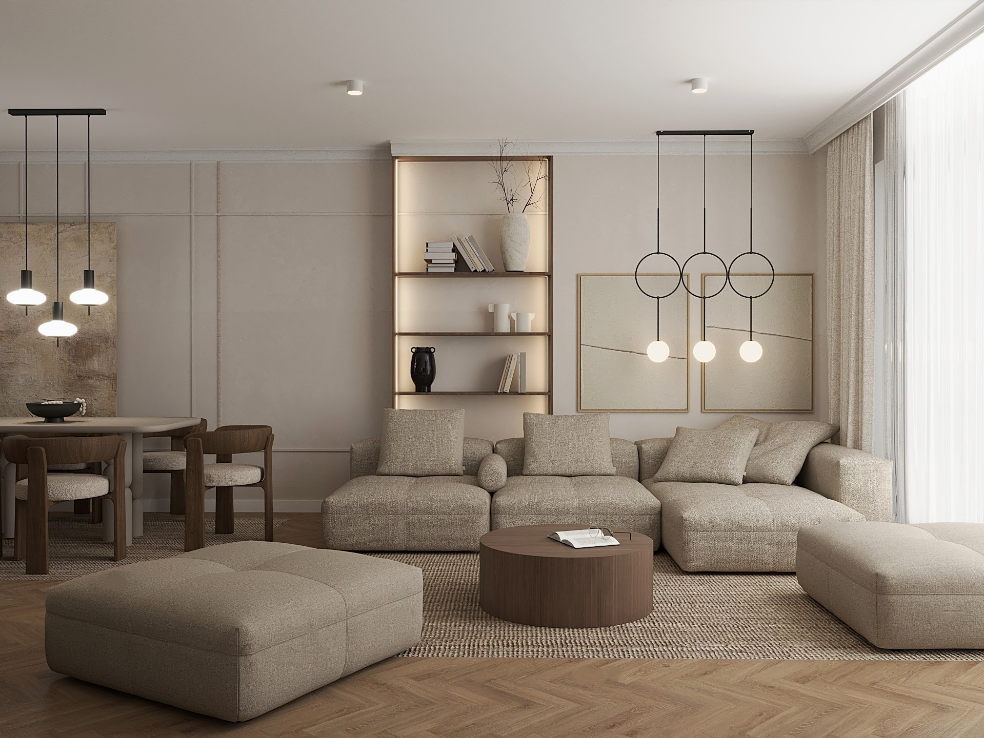 Jasne, przestronne wnętrze salonu z beżową sofą modułową, drewnianym stolikiem kawowym i dywanem w neutralnych barwach. Widoczne lampy wiszące i regał z oświetleniem.