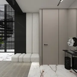 Nowoczesne wnętrze z spiralnymi schodami, minimalistyczną konsolą z dekoracyjnymi dyskami i panelami tapicerowanymi w odcieniach bieli i szarości.