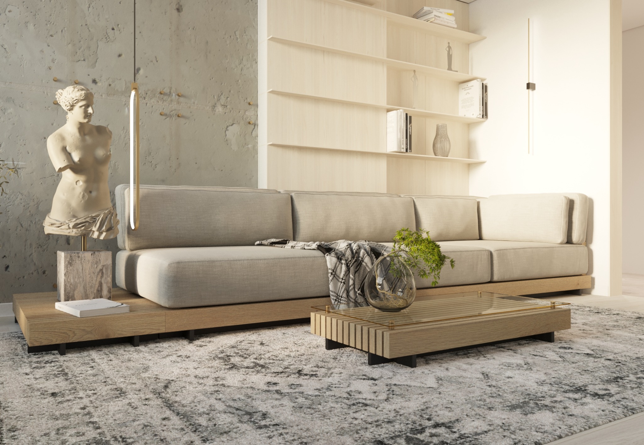Jasny salon z beżową sofą, drewnianym stolikiem kawowym ze szklanym blatem, rzeźbą klasycznej postaci i betonową ścianą w tle.