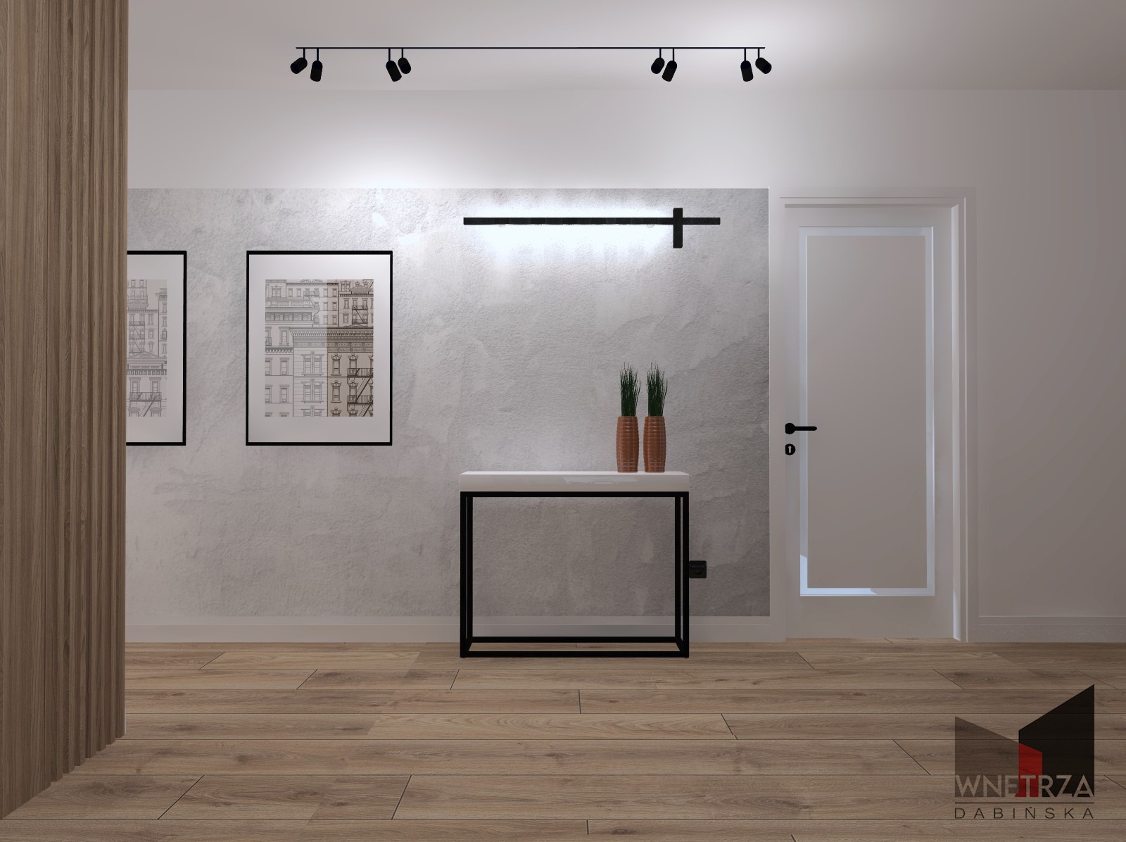 Nowoczesny przedpokój z drewnianą podłogą, konsolą z marmurowym blatem, dwoma obrazami w czarnych ramach i minimalistycznym oświetleniem sufitowym oraz ściennym.