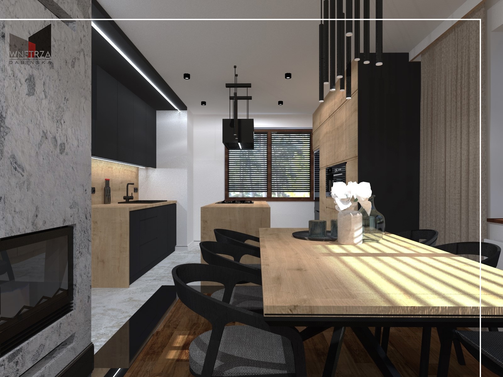 Wizualizacja nowoczesnego wnętrza z otwartą kuchnią, jadalnią i betonowym kominkiem; czarne szafki kuchenne kontrastują z drewnianymi blatami, a nad stołem jadalnym wiszą designerskie lampy.