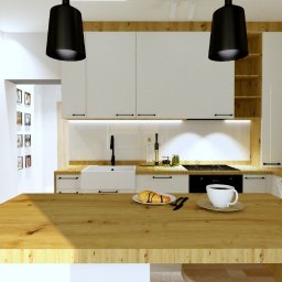 KIMERA Design Studio - Jasna kuchnia z drewnianym blatem, czarnymi lampami i sprzętem Electrolux. Minimalistyczny styl, detale jak rogalik i kawa dodają przytulności.