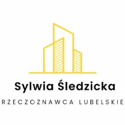 Logo rzeczoznawcy z Lublina: żółty, uproszczony zarys budynku, imię i nazwisko 'Sylwia Śledzicka' oraz dopisek 'RZECZOZNAWCA LUBELSKIE'.