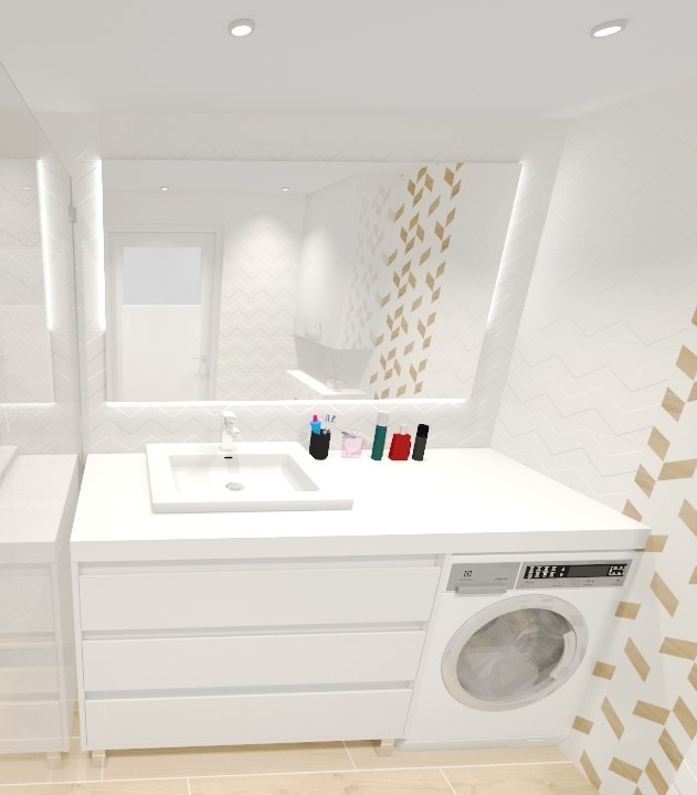 Biała umywalka z szafką i pralką w nowoczesnej łazience z geometrycznym wzorem na ścianie, widoczne kosmetyki na blacie.