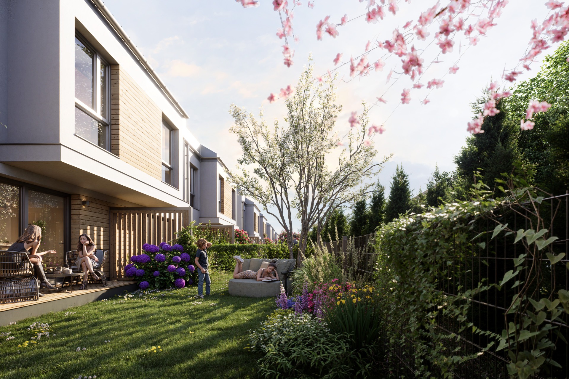 Wizualizacja osiedla domów jednorodzinnych z ogrodem, gdzie widać relaksujących się ludzi. Uwagę przyciąga bujna roślinność i nowoczesna architektura budynków.