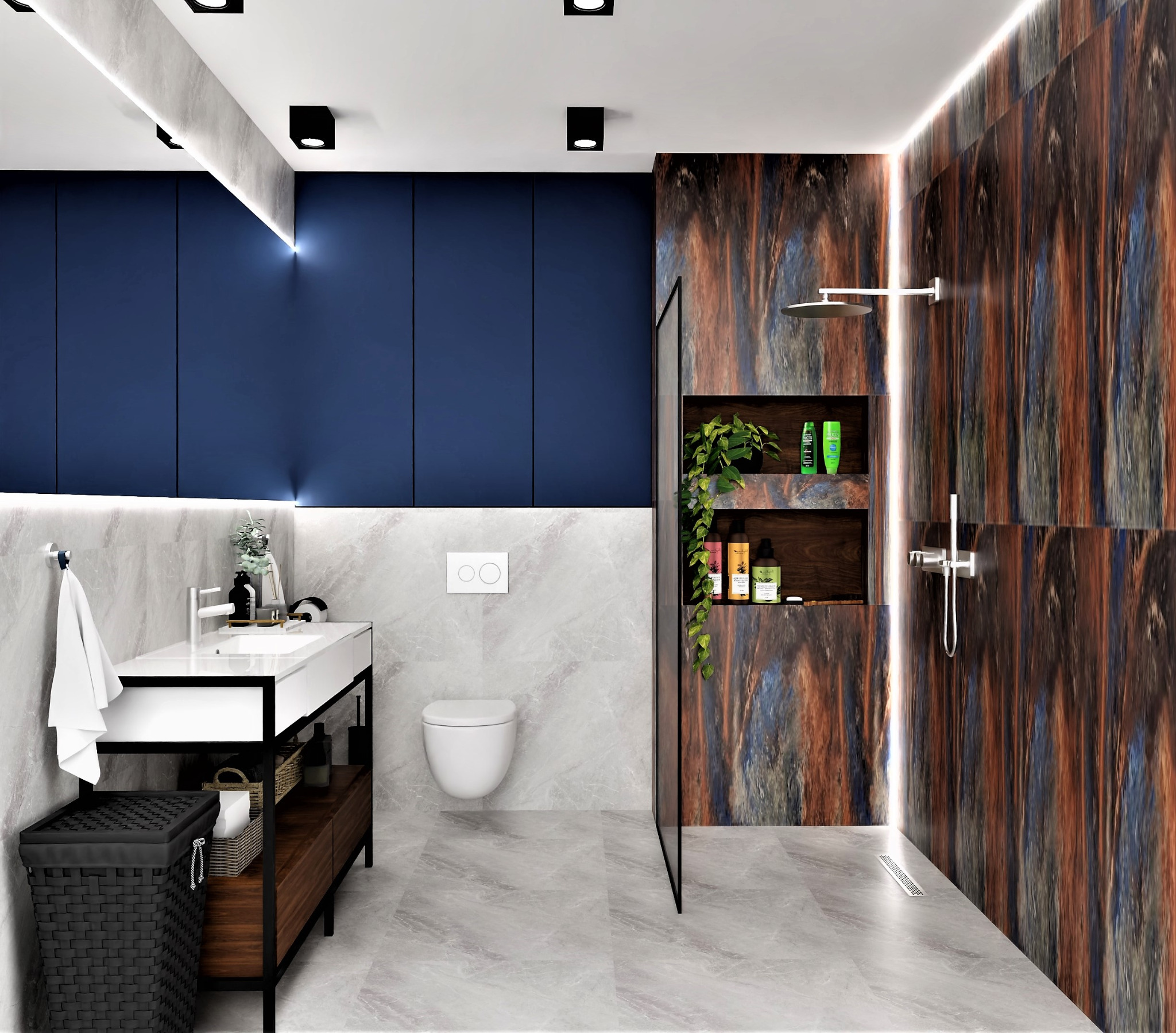 Nowoczesna łazienka z niebieskimi szafkami, marmurowymi płytkami, kabiną prysznicową typu walk-in i drewnianymi akcentami, oświetlona ledowym paskiem.