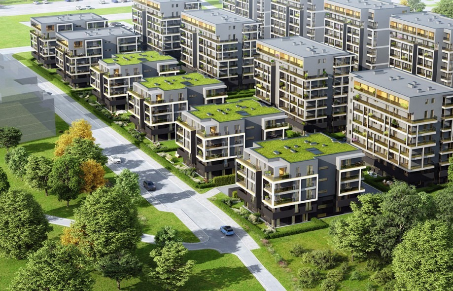 Nowoczesne osiedle z zielonymi dachami, widok z lotu ptaka. Szare budynki z balkonami, otoczone zielenią i drogami. Architektura minimalistyczna, słoneczny dzień.