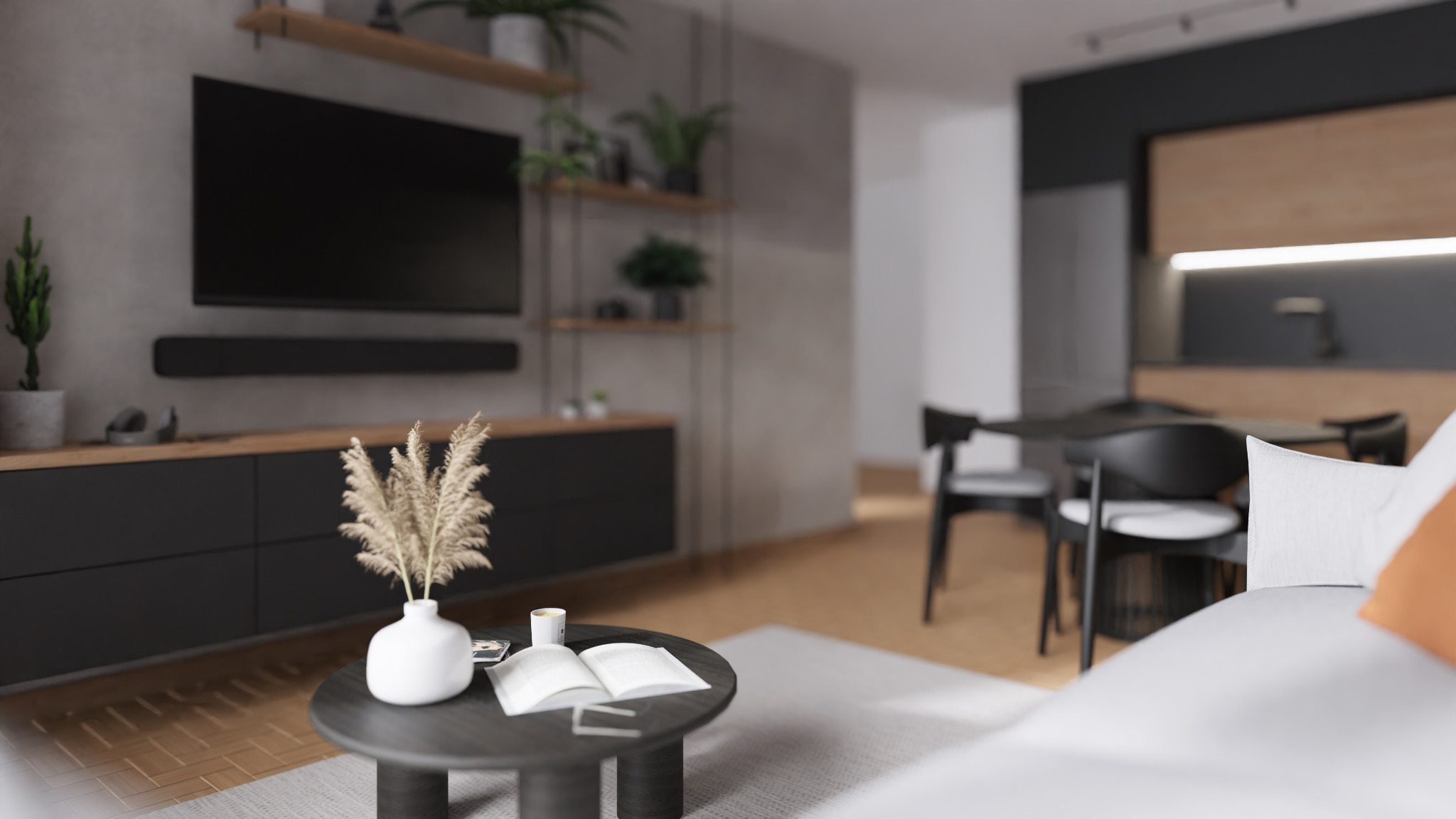 Wnętrze salonu z telewizorem na ścianie, szafką RTV, stolikiem kawowym z wazonem i książką, oraz jadalnią w tle, utrzymane w szarościach, czerni i drewnie.