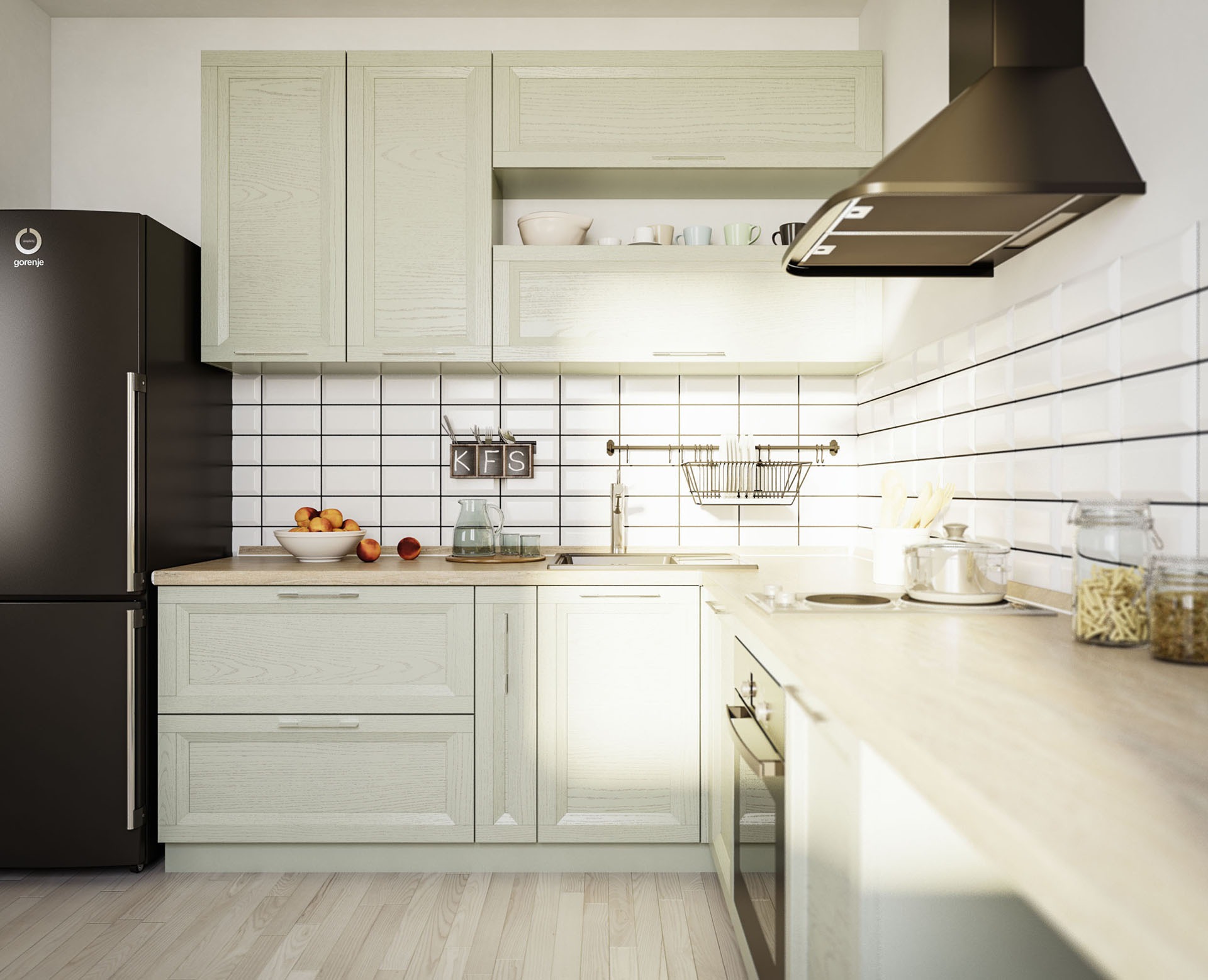 Jasna kuchnia z drewnianymi frontami, czarną lodówką Gorenje i okapem. Na blacie o drewnianym wykończeniu stoją owoce, dzbanek z wodą, naczynia i słoiki z makaronem. Ściana wyłożona białymi...