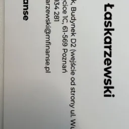 Wizytówka eksperta finansowego Jerzego Łaskarzewskiego z adresem biura w Poznaniu, numerem telefonu i adresem e-mail.