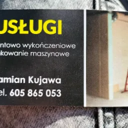 Wizytówka firmy remontowo-wykończeniowej Damian Kujawa, z numerem telefonu i zdjęciem wnętrza w trakcie prac wykończeniowych, z widoczną czerwoną drabiną.