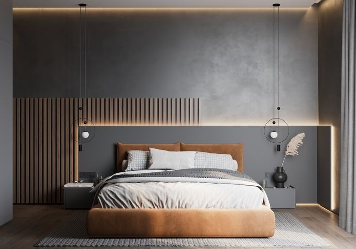 Nowoczesna sypialnia z łóżkiem o brązowej ramie, szarą ścianą z drewnianymi panelami i minimalistycznymi lampami wiszącymi, oświetleniem LED i dywanem w geometryczny wzór.