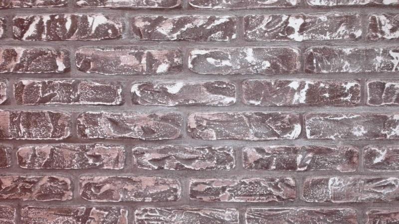 Tekstura ściany z cegły w odcieniach brązu i bieli, z wyraźnie zaznaczonymi spoinami, imitująca starą cegłę z efektem postarzenia.