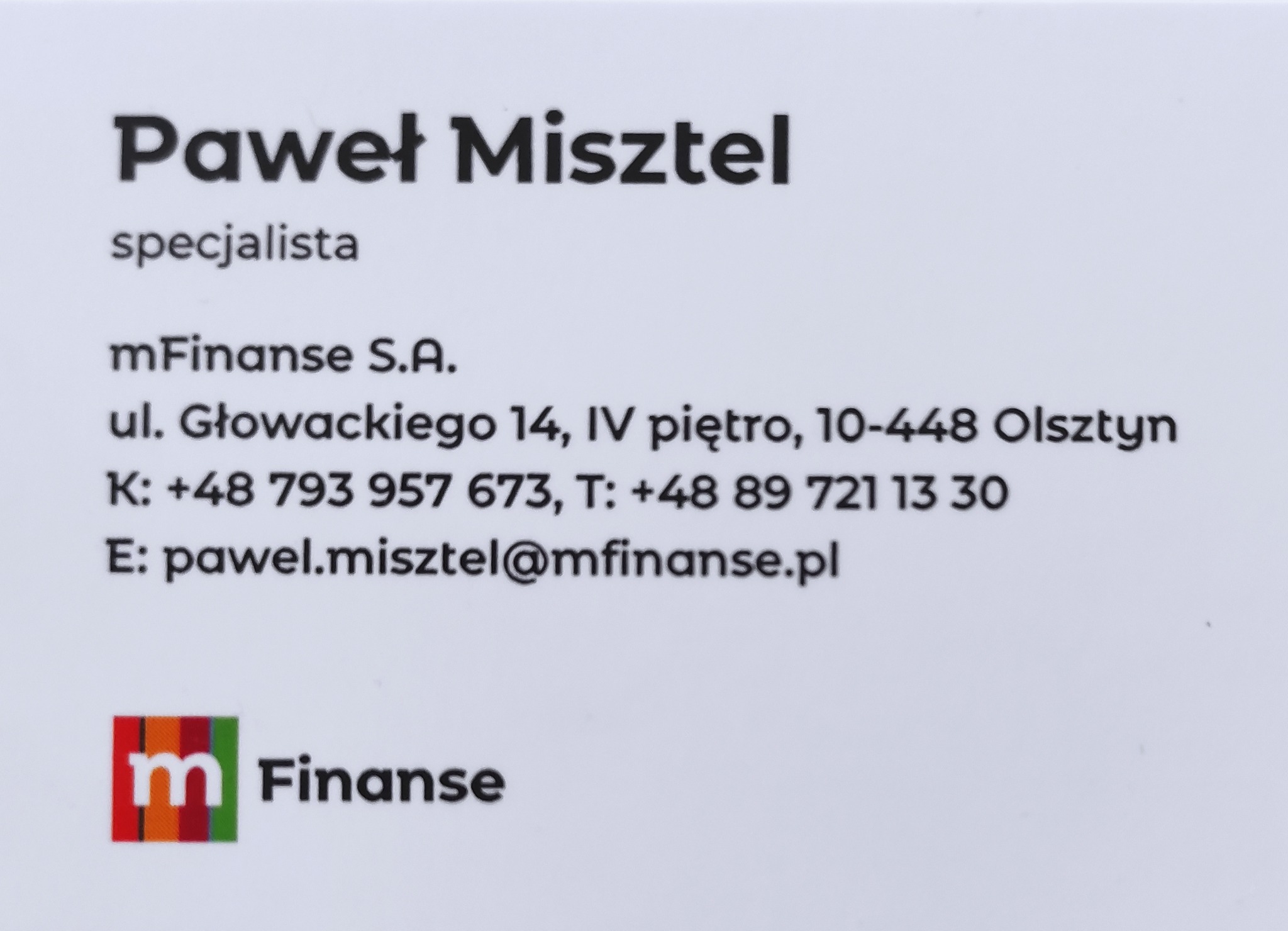 Wizytówka specjalisty finansowego Pawła Misztela z firmy mFinanse S.A. zawierająca dane kontaktowe: adres, numery telefonów i adres e-mail.
