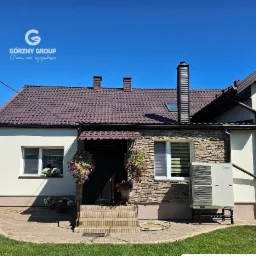 Realizacja ocieplenia ścian, stropu oraz wymiana starego kotła na pompę ciepła Panasonic.