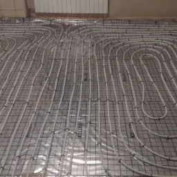 Wyklucie starej wylewki ,przygotowanie pod ogrzewanie podłogowe wraz z montażem