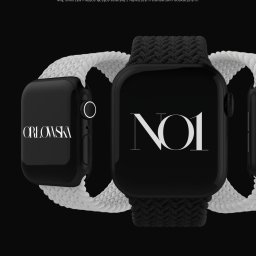 Patryk Markowski - markovsky.co - Mockup strony internetowej Orłowska Academy na smartwatchach. Elegancki design z logo i tekstem informacyjnym. Minimalistyczna estetyka w czerni i bieli.