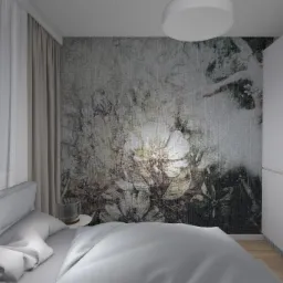 Minimalistyczna sypialnia z łóżkiem w odcieniach szarości, ozdobną ścianą w kwiatowe wzory i białą zabudową szafy.