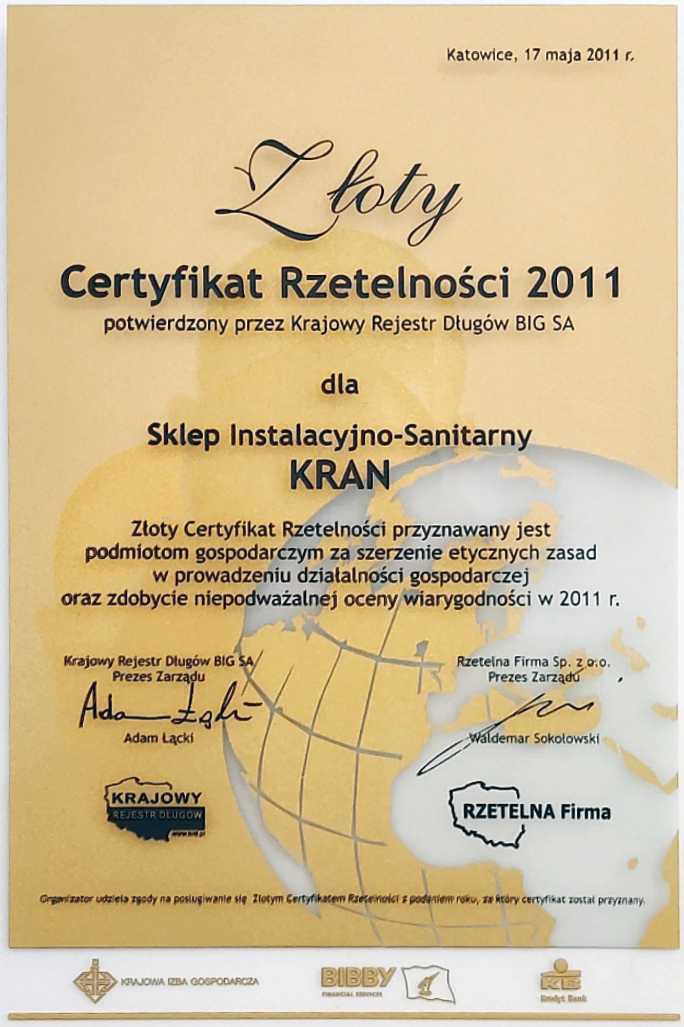Zeskanowany Złoty Certyfikat Rzetelności 2011 dla Sklepu Instalacyjno-Sanitarnego KRAN, podpisany przez Krajowy Rejestr Długów BIG SA i Rzetelna Firma Sp. z o.o., z logotypami Krajowej Izby...