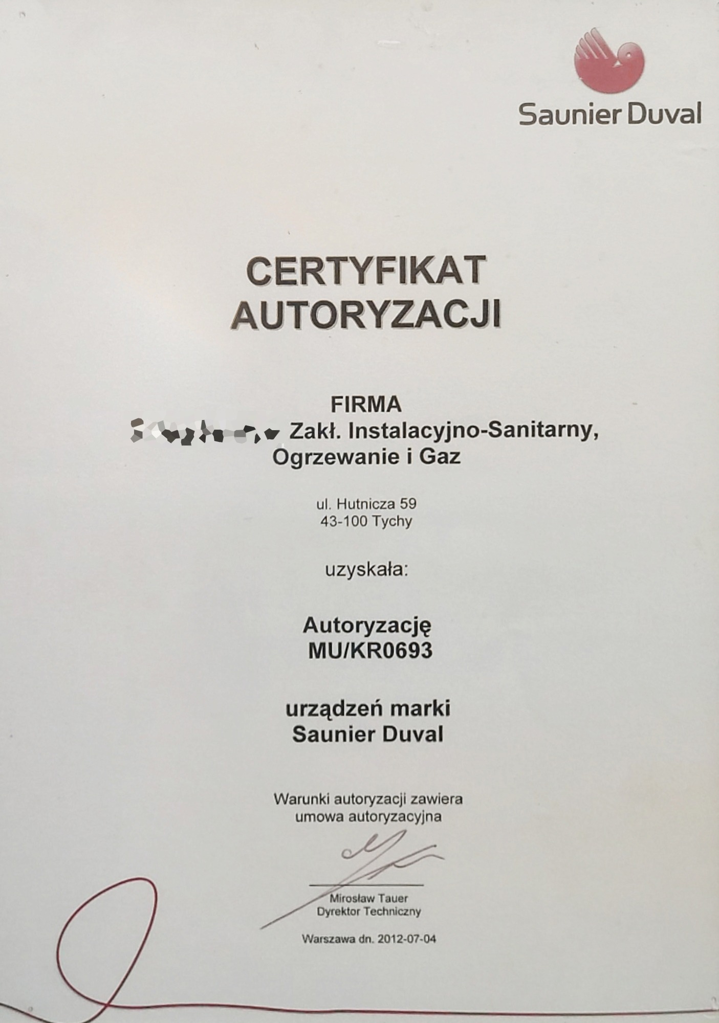 Skan certyfikatu autoryzacji firmy instalacyjno-sanitarnej, ogrzewanie i gaz, na urządzenia marki Saunier Duval, wydany w Tychach w 2012 roku, podpisany przez Dyrektora Technicznego Mirosława Tauera.