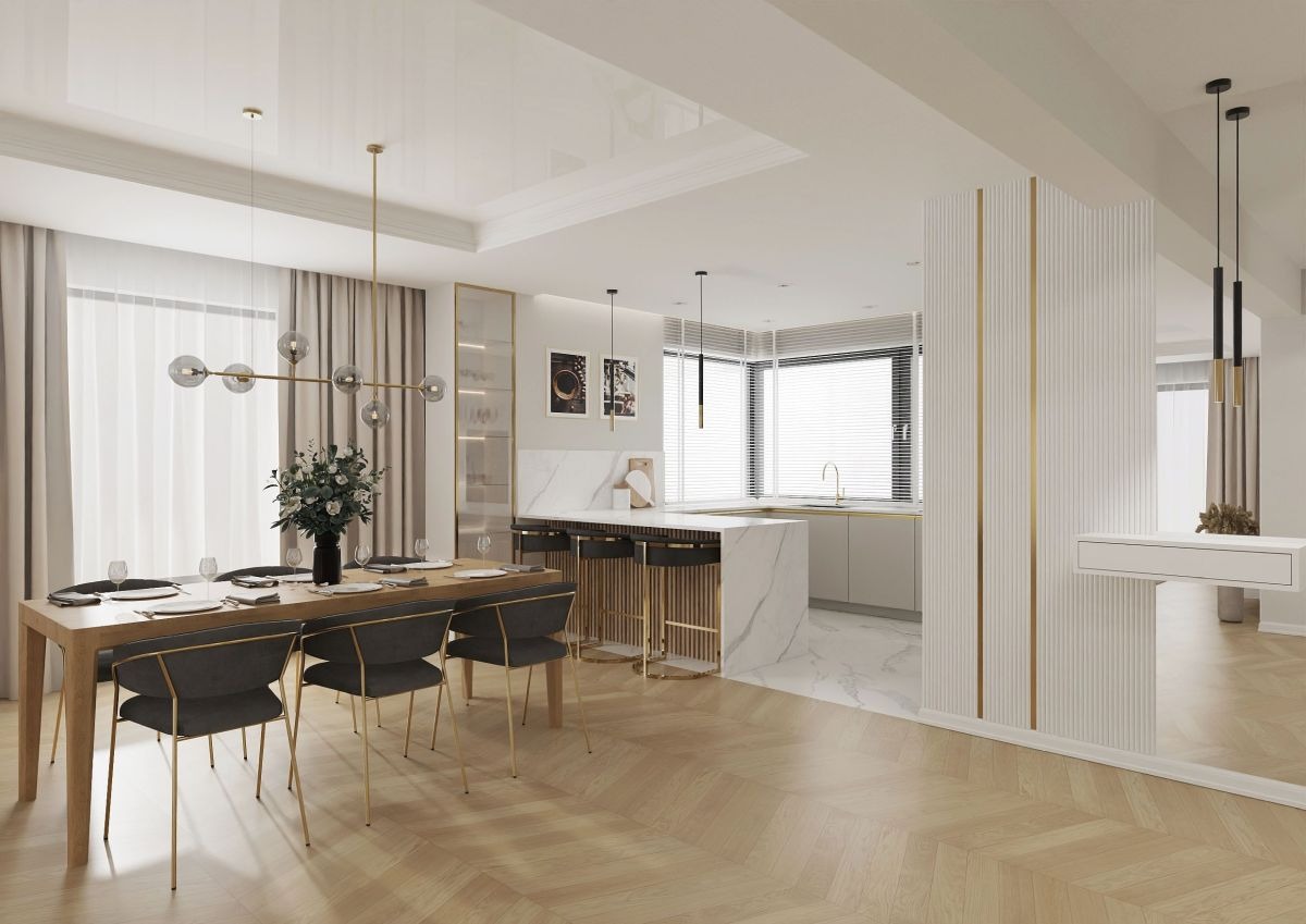 Jasne wnętrze z otwartą kuchnią, jadalnią i marmurową wyspą, parkiet w jodełkę, złote akcenty i nowoczesne oświetlenie.
