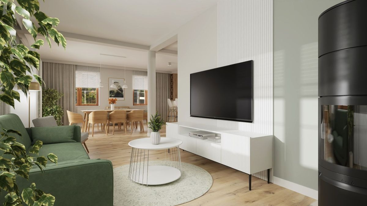 Wizualizacja salonu z zieloną sofą, telewizorem na ścianie z lamelami, okrągłym stolikiem kawowym i kominkiem w rogu, widok na jadalnię w tle.