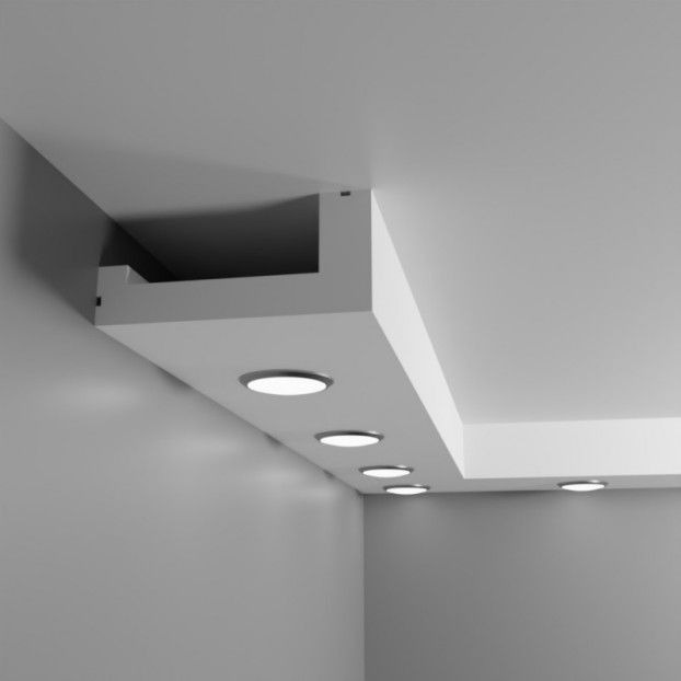 Szary pokój z podwieszanym sufitem z wbudowanymi okrągłymi lampami LED, widok z dołu, minimalistyczny design.