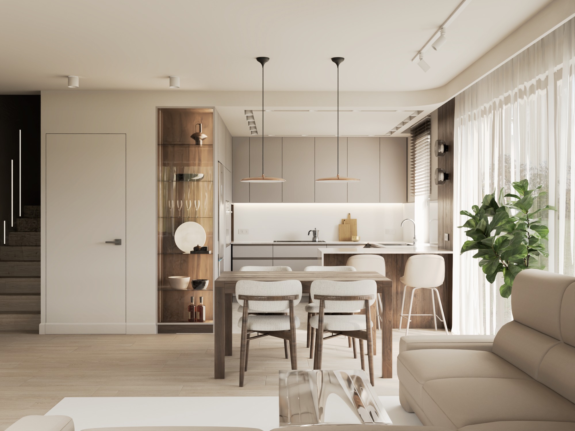 Nowoczesna, jasna kuchnia z drewnianym stołem i krzesłami. Minimalistyczne szafki, wyspa z hokerami i duża roślina doniczkowa dodają wnętrzu przytulności.