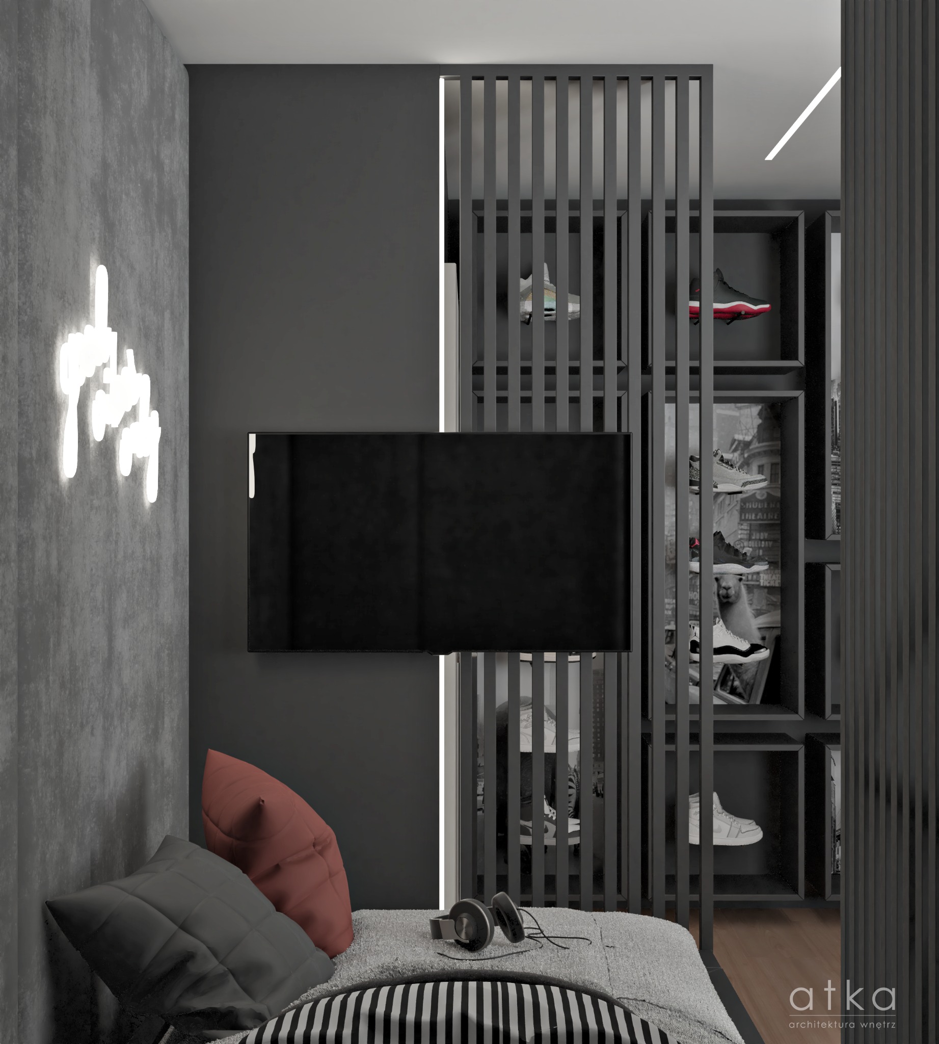 Pokój młodzieżowy w odcieniach szarości z neonowym napisem na ścianie, telewizorem i półkami z ekspozycją obuwia sportowego za ażurową ścianką działową.