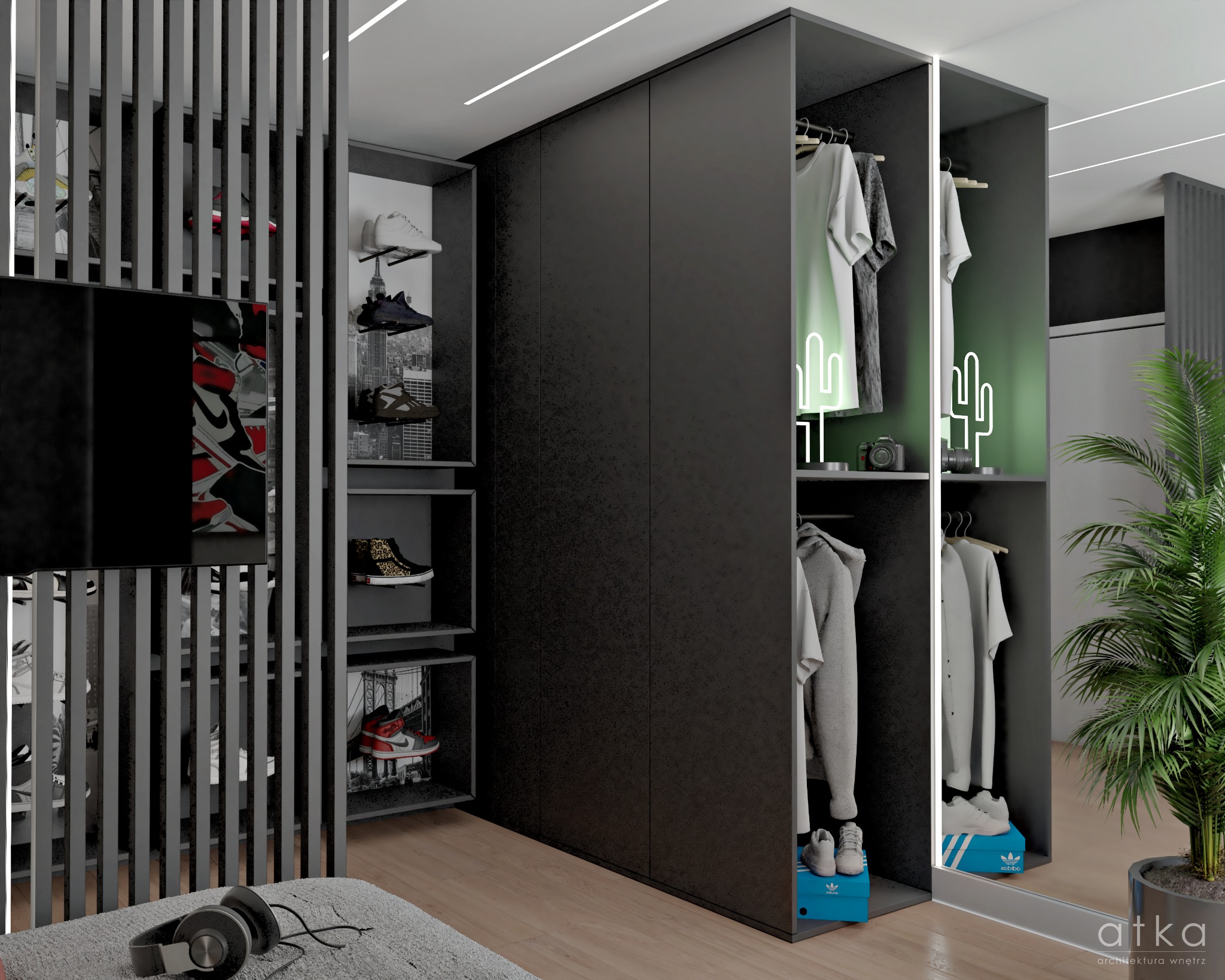 Nowoczesna garderoba z czarnymi szafami, otwartymi półkami na buty, podświetleniem LED w kształcie kaktusów, telewizorem z motywem obuwia sportowego i dekoracyjną ścianką z lameli, uzupełniona...