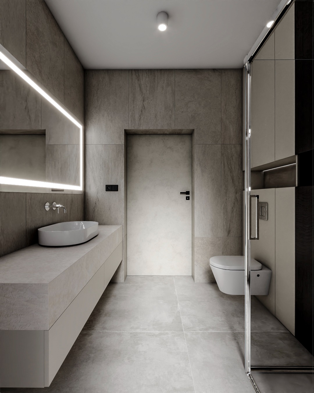 Nowoczesna łazienka z podświetlanym lustrem, umywalką nablatową i kabiną prysznicową. Minimalistyczny design, stonowana kolorystyka, płytki imitujące kamień.