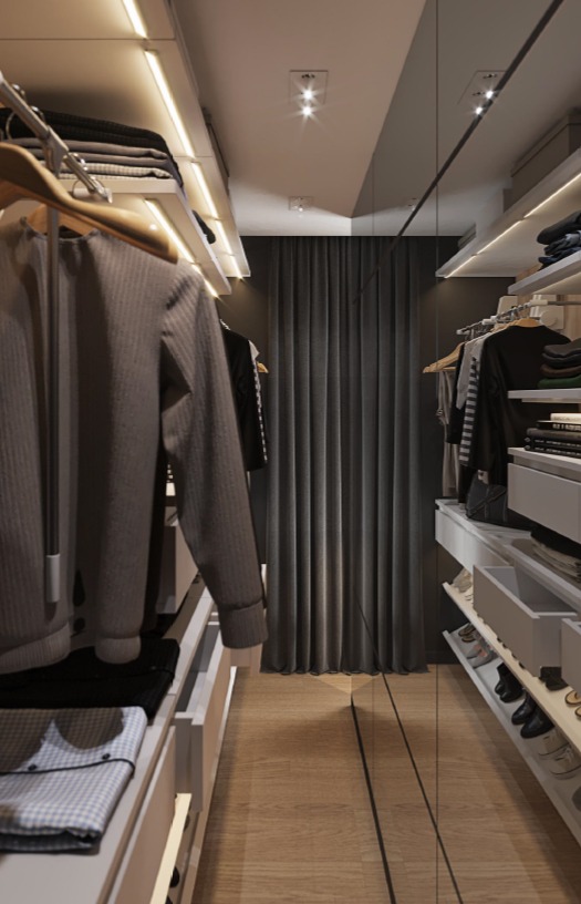Wnętrze garderoby z oświetleniem LED w szafach, widok na drewnianą podłogę i zasłony w tle.