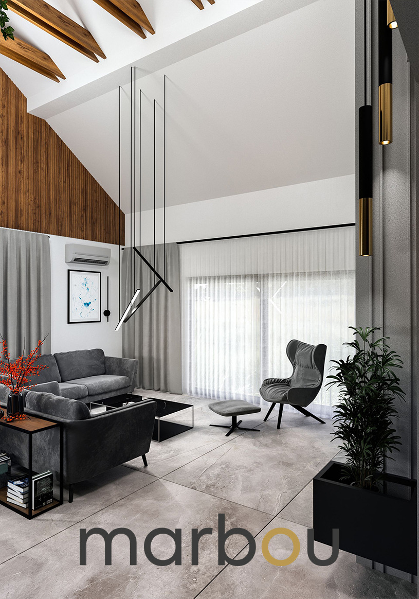 Nowoczesny salon w Krakowie z wysokim sufitem, drewnianą ścianą, szarą sofą narożną, fotelem typu uszak, minimalistycznym oświetleniem i dużą rośliną doniczkową w czarnej skrzynce.