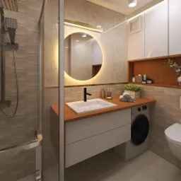 Nowoczesna łazienka z okrągłym lustrem podświetlanym LED, białą umywalką nablatową na drewnianym blacie, pralką ukrytą pod blatem, wiszącą toaletą i kabiną prysznicową z deszczownicą.