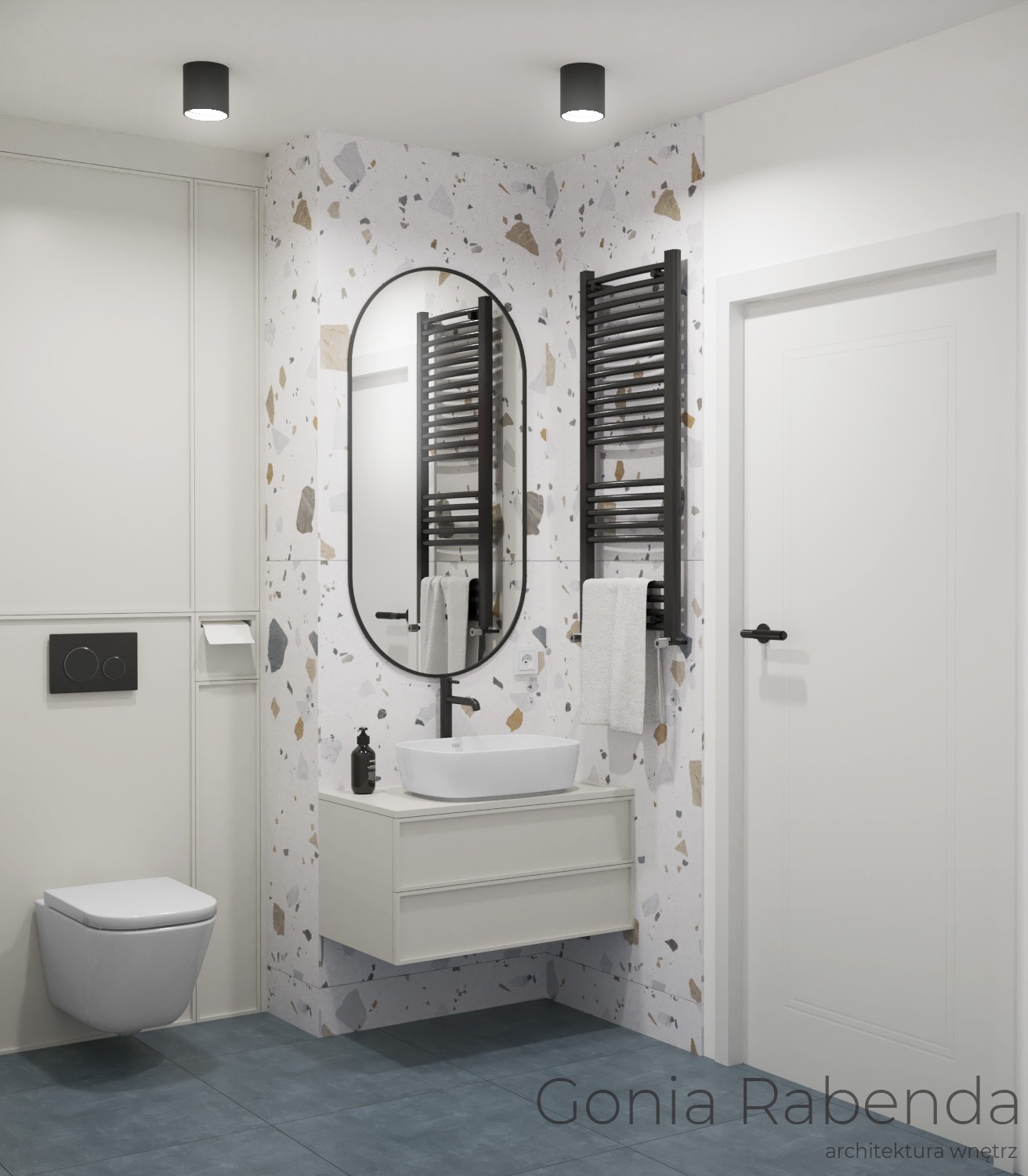 Wizualizacja nowoczesnej łazienki z umywalką nablatową, owalnym lustrem w czarnej ramie, grzejnikiem drabinkowym i płytkami imitującymi lastryko na ścianie.