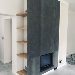 marcin pingwara architekt - kominek to centralne miejsce domu, wykończenie fornir kamienny...