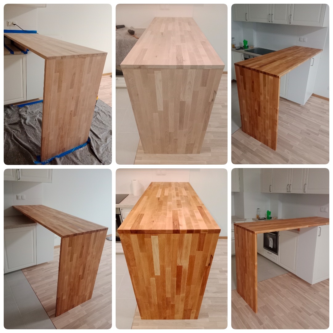 Drewniany blat kuchenny z klejonego drewna bukowego, zamontowany na białych szafkach kuchennych, widok z różnych perspektyw, widoczny fragment podłogi i ściany, na podłodze folia ochronna.