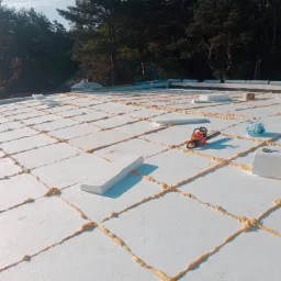 Termoizolacja (podstawa 25 cm wraz ze spadkiem 3 cm na metrze ), realizacja przeczkola w Lutomiersku.