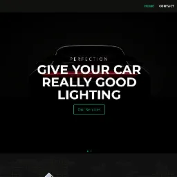 Strona internetowa firmy JOJA z ciemnym motywem, prezentująca tekst 'GIVE YOUR CAR REALLY GOOD LIGHTING' nad sylwetką samochodu Porsche.