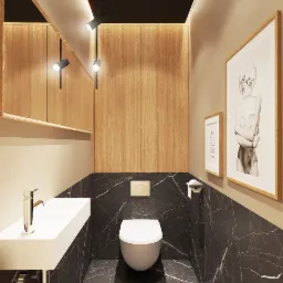 Nowoczesna łazienka z czarnym marmurem, wiszącą toaletą, prostokątną umywalką i drewnianymi szafkami, oświetlona punktowymi lampami i ozdobiona minimalistycznymi obrazami w ramkach.