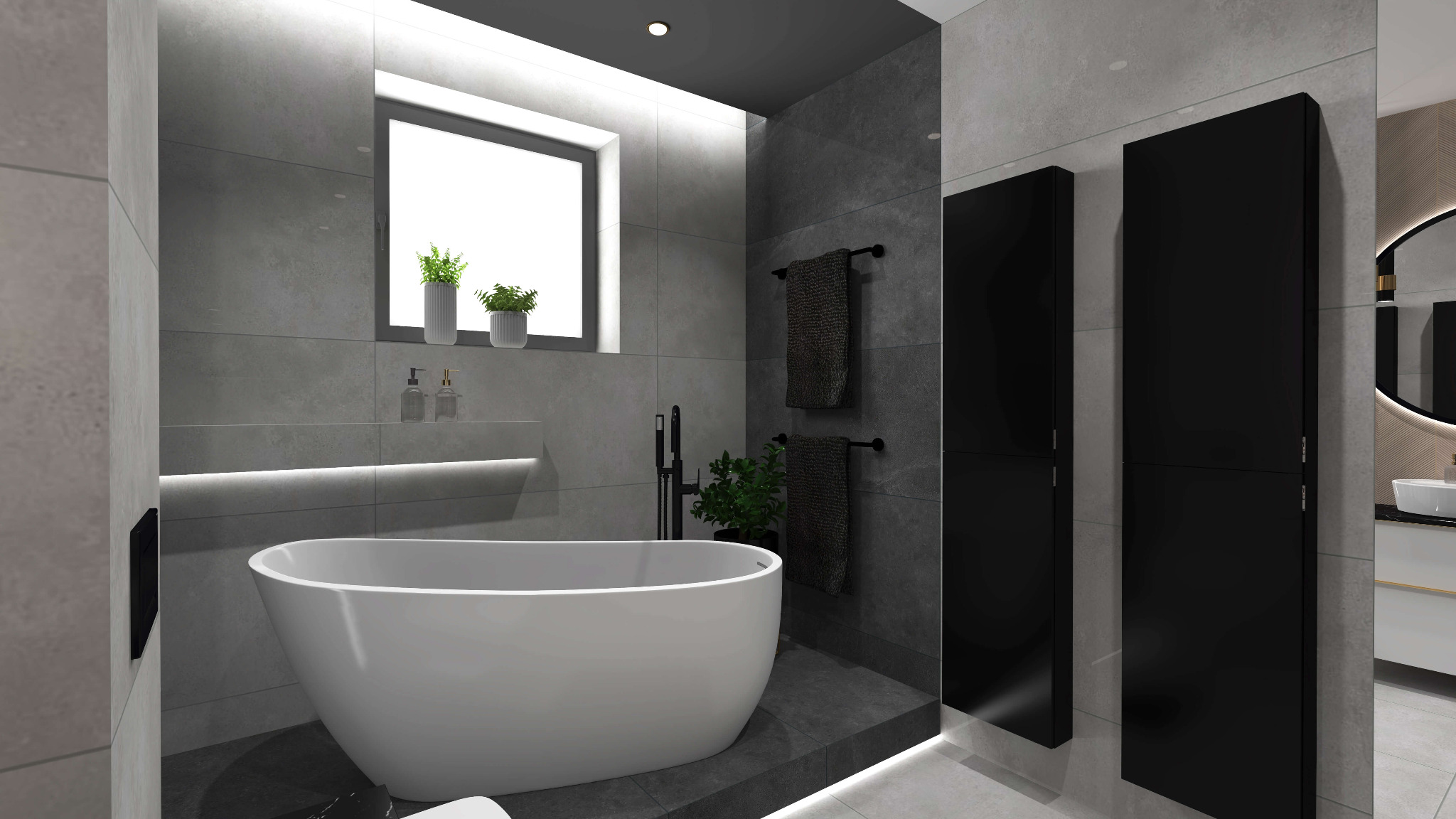 Nowoczesna łazienka w odcieniach szarości z wolnostojącą białą wanną, czarną armaturą i grzejnikami panelowymi, podświetlana półka z roślinami i kosmetykami.