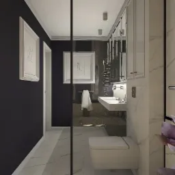 Nowoczesna łazienka z czarną ścianą, marmurowymi płytkami i minimalistyczną umywalką, ozdobiona obrazami w białych ramach i kwiatem magnolii w prawym dolnym rogu.