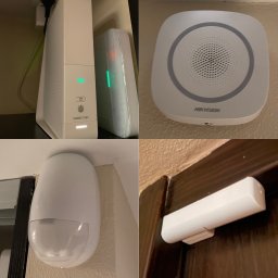 MIB Systemy Zabezpieczeń - Elementy systemu zabezpieczeń: centrala alarmowa z diodami, głośnik alarmowy Hikvision, czujnik ruchu i kontaktron na ramie drzwi.