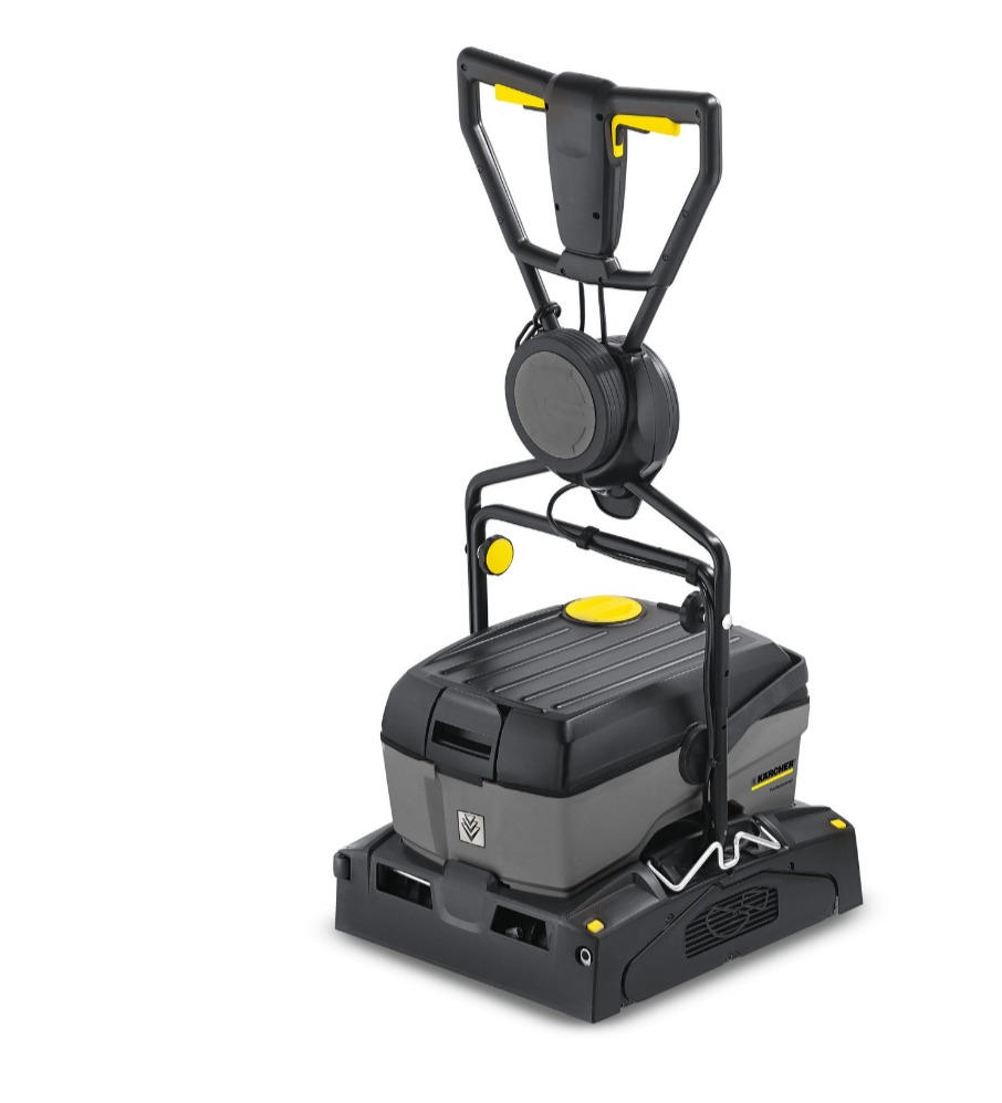 Profesjonalna maszyna czyszcząca Karcher w kolorze czarno-szarym z żółtymi akcentami, widoczna na białym tle, z uchwytem w kształcie litery T i pojemnikiem na płyn.