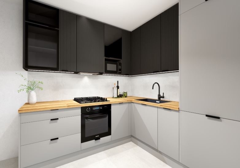 Nowoczesna kuchnia w odcieniach szarości i czerni z drewnianym blatem. Minimalistyczny design, oświetlenie LED pod szafkami, czarna armatura i sprzęt AGD.